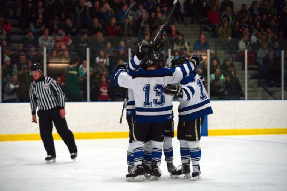 Hockey athletes celebrate win